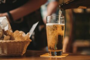 pouring beer from bottle